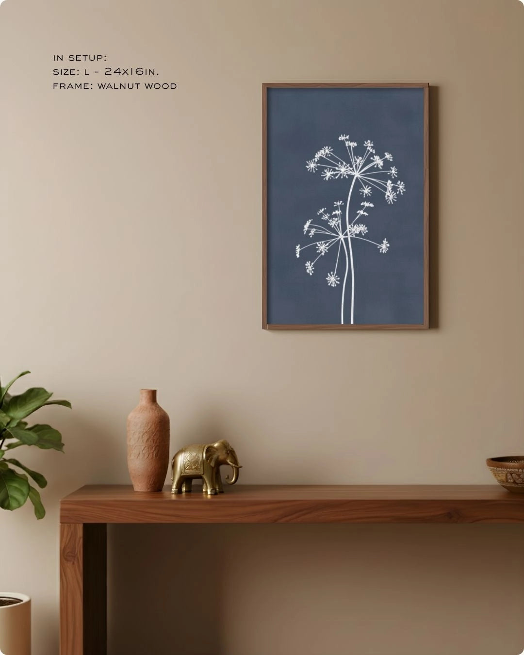 Sophisticated navy blue botanical line art by K2C Co. in a Noir Black frame, creating a moody minimalist statement in a modern home.