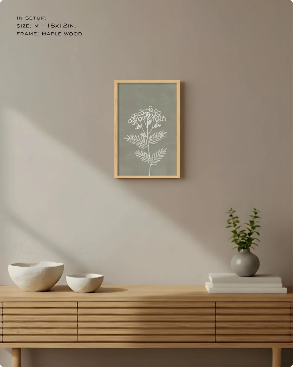 Medium (Size M) sage green minimalist line art by K2C Co., featured in an organic modern living room setup above a wooden sideboard.