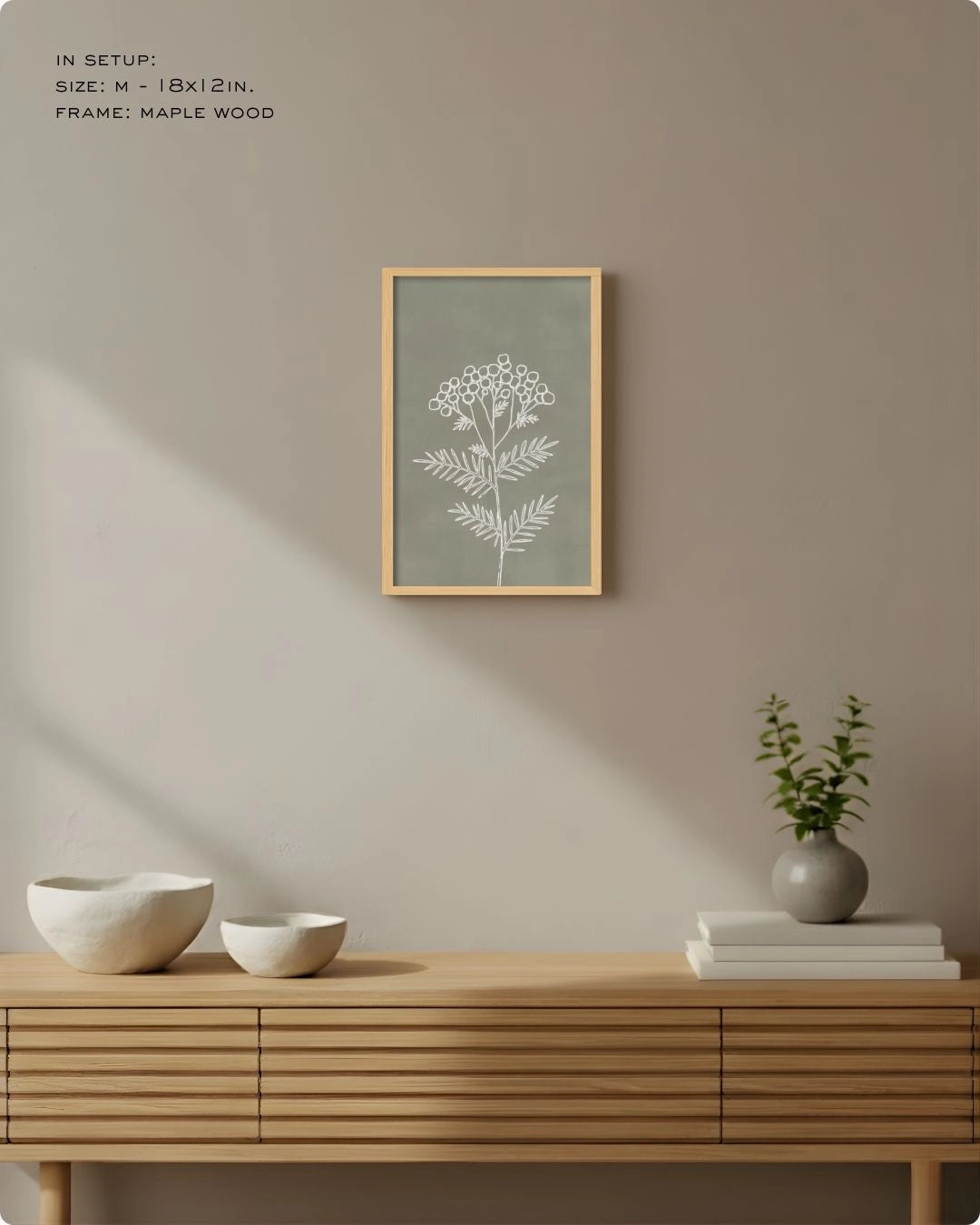 Medium (Size M) sage green minimalist line art by K2C Co., featured in an organic modern living room setup above a wooden sideboard.
