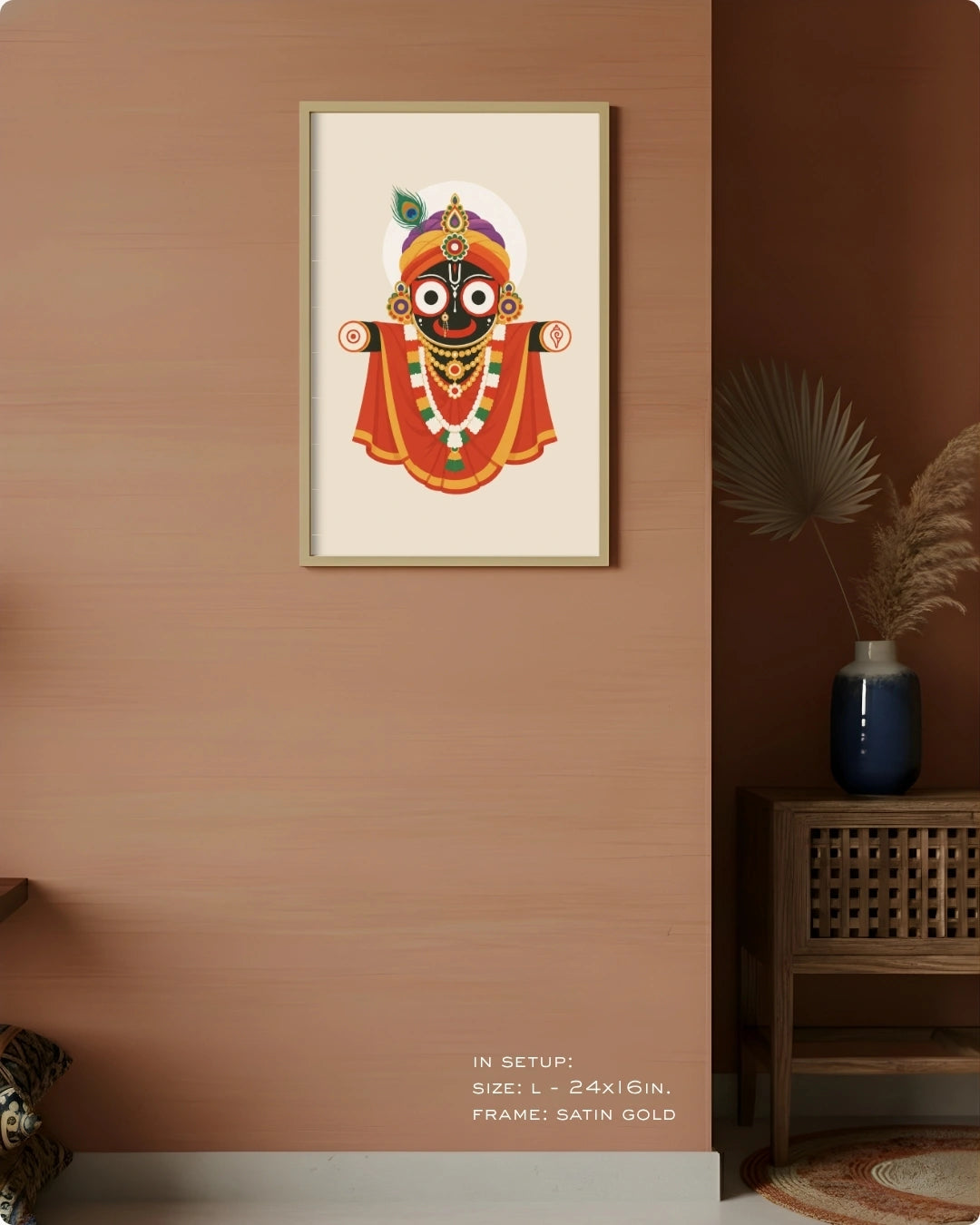 Visual size guide mockup for the Majestic Hindu deity Lord Jagannath wall art in Large size with a satin gold frame, displayed against a warm terracotta accent wall.