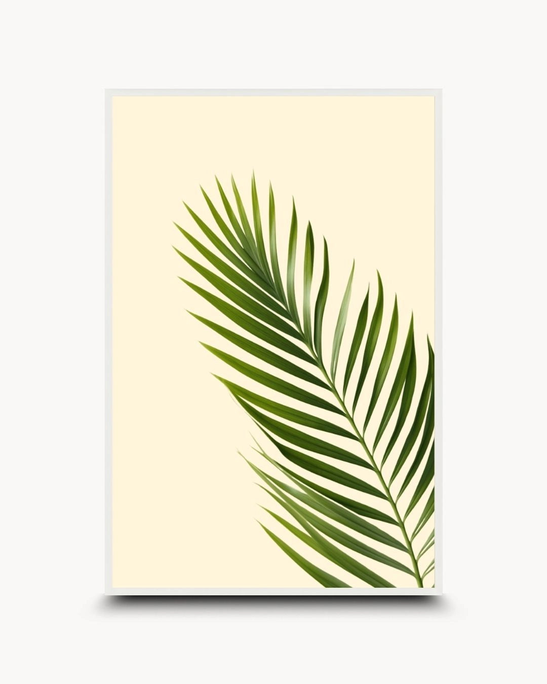 K2C Co. tropical palm leaf artwork in a Moon White frame. A clean, minimalist botanical print on a neutral background, perfect for a bright Japandi-style living room or modern office.