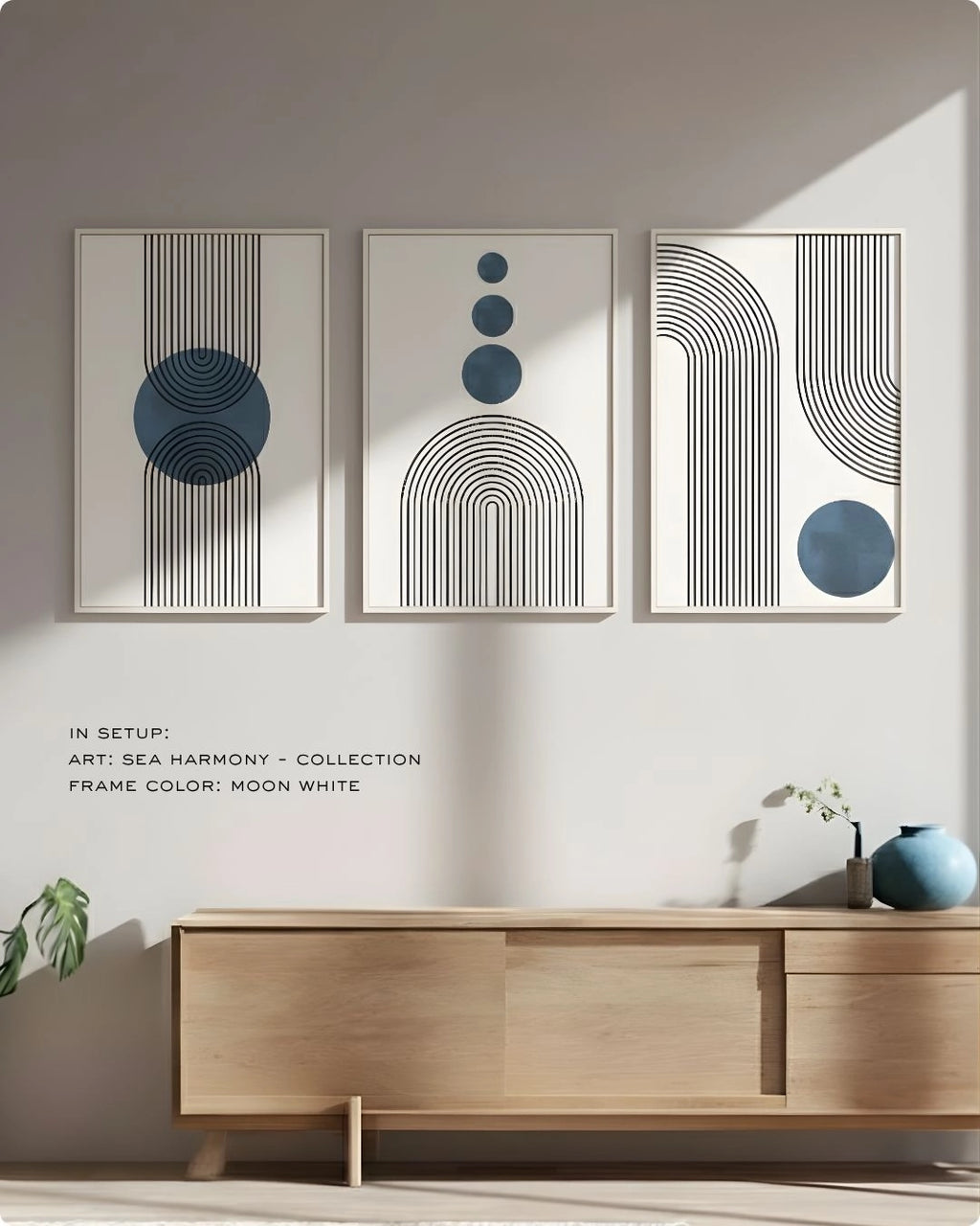 K2C Co. Sea Harmony 3-piece abstract blue gallery wall set in Moon White frames, featuring minimalist navy geometric prints in a clean, modern entryway setting above a light wood console.