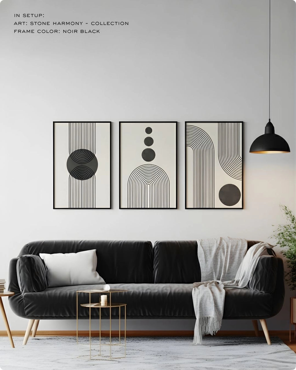K2C Co. Stone Harmony 3-piece charcoal grey gallery wall art set in Noir Black frames, featuring high-contrast geometric abstract prints above a sleek black leather sofa in a modern industrial living room.