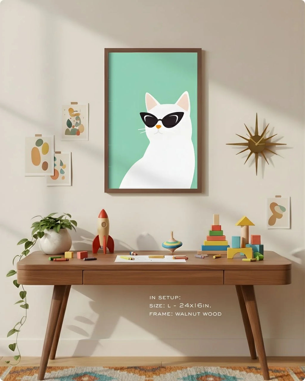 Large (Size L - 24x16in) cat with sunglasses art in a Walnut Wood frame, demonstrating scale above a modern wood desk with a retro starburst clock.