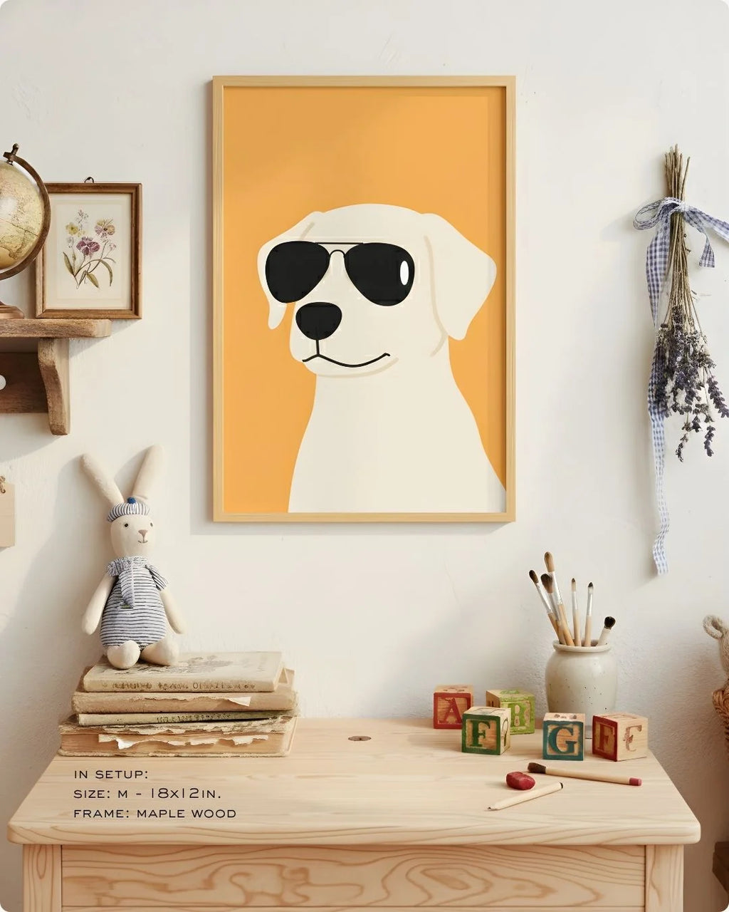 Close-up of the "Cool Dog" illustration in a Maple Wood frame, styled on a child's light wood desk with art supplies.