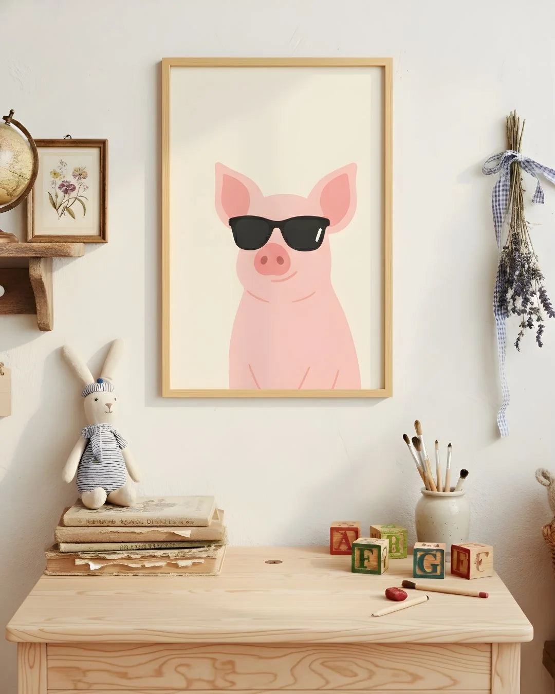 Playful pig with sunglasses print in a 0.5-inch Maple Wood frame, styled in a light-filled nursery with wooden toys and blocks.