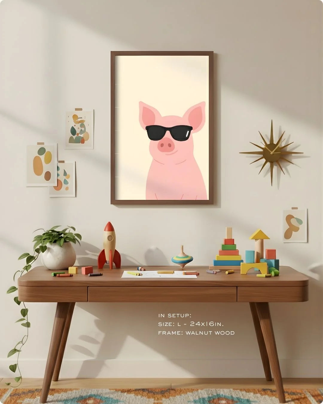 Large (Size L - 24x16in) pig with sunglasses art in a Walnut Wood frame, demonstrating scale above a modern wood desk with a starburst clock.