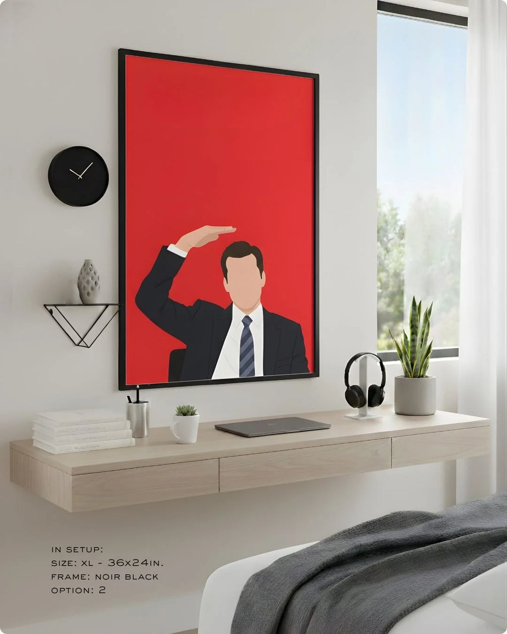 Minimalist Harvey Specter "Suits" print in an XL Noir Black frame (24x36in) styled above a light wood floating desk in a modern bedroom-office.