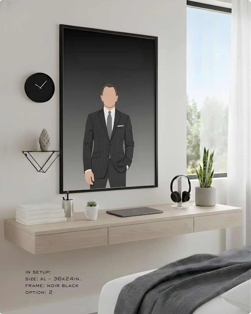 Minimalist James Bond 007 print in an XL Noir Black frame (24x36in) styled above a light wood floating desk in a modern bedroom-office.