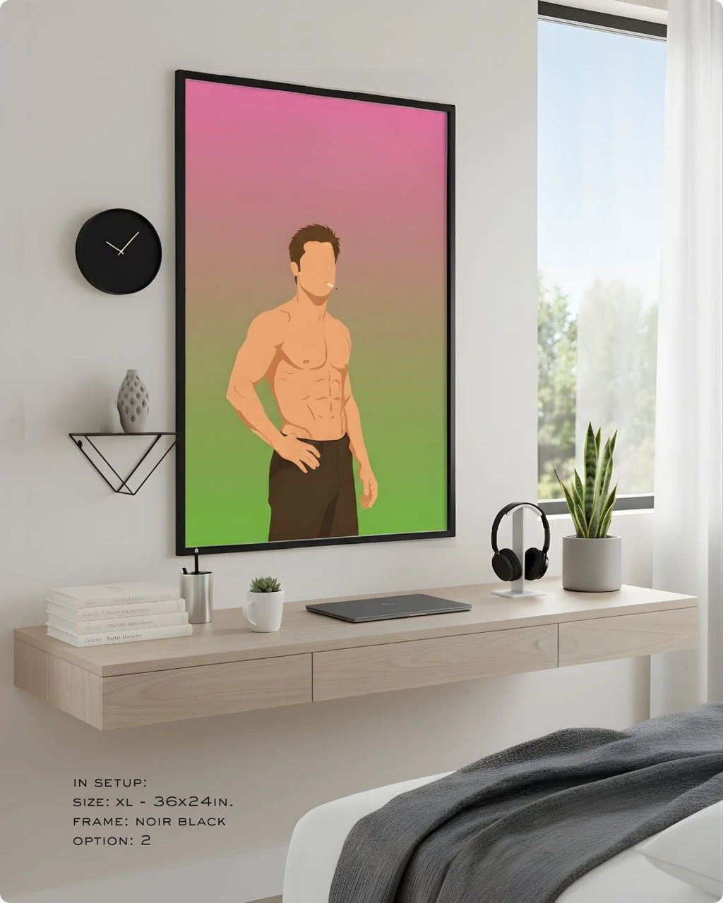 Minimalist Tyler Durden (Fight Club) print in an XL Noir Black frame (24x36in) styled above a light wood floating desk in a modern bedroom-office.