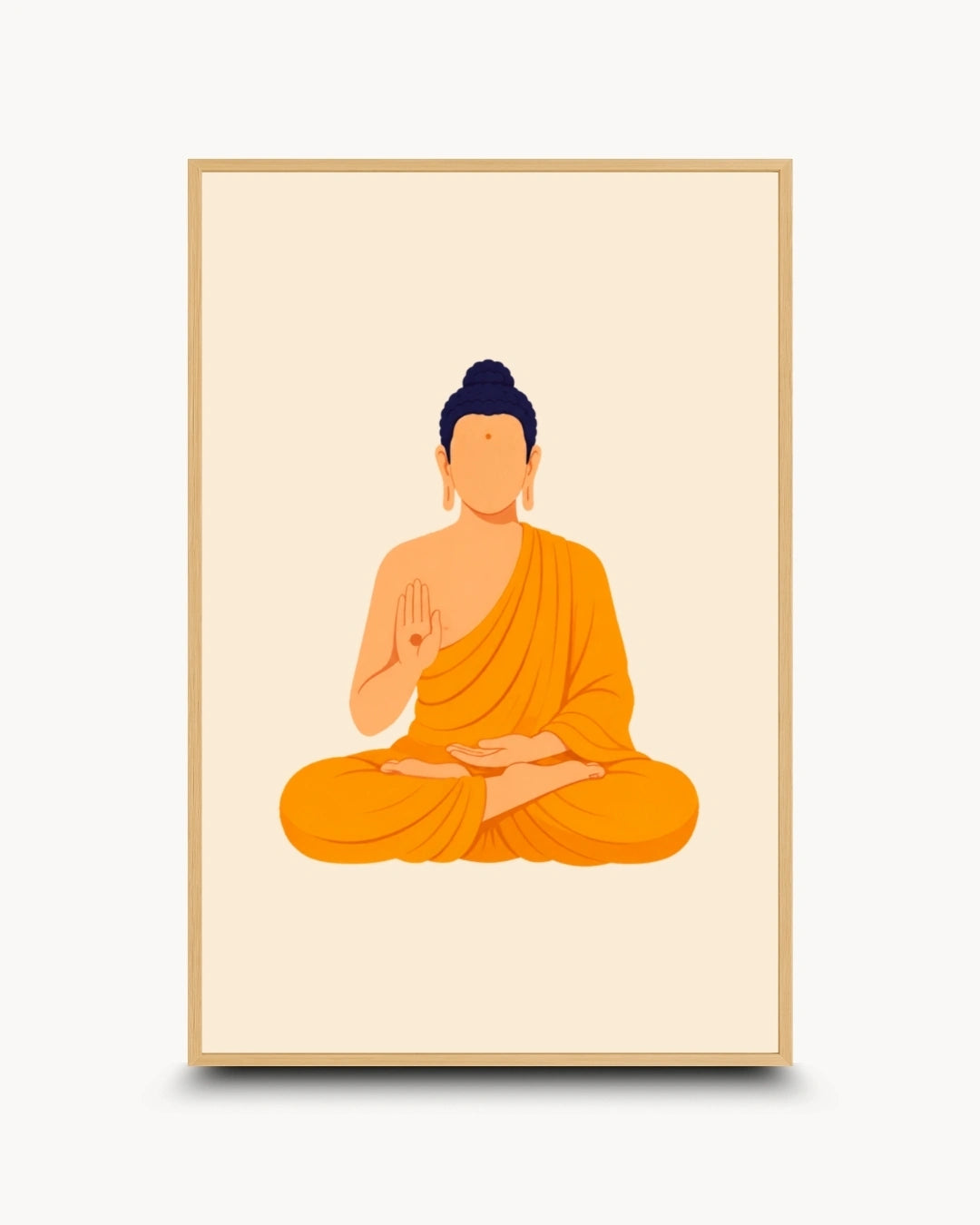 A minimalist framed art print featuring a seated Buddha in orange robes against a warm cream background, enclosed in a light wood frame.