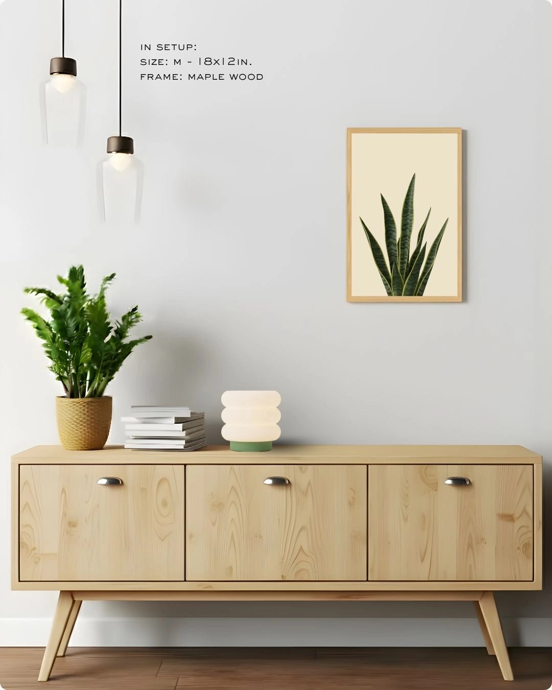 Medium (Size M) snake plant botanical print by K2C Co. in a Maple Wood frame, perfect for accent wall decor in a Japandi home.