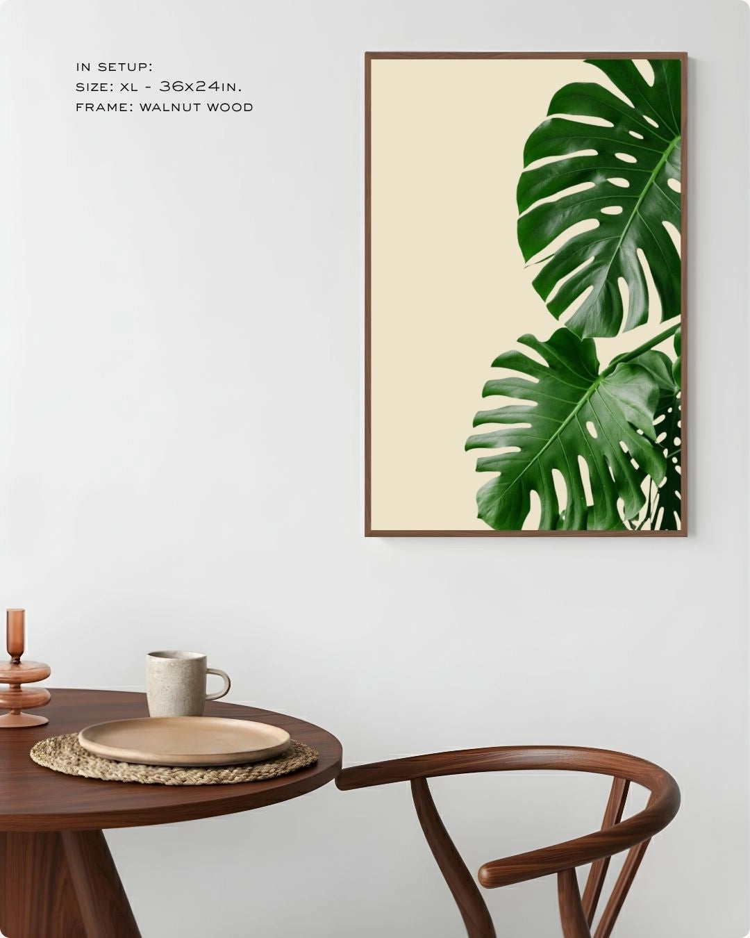 Minimalist banana leaf wall art in a Walnut Wood frame by K2C Co., featured in a warm, cozy dining room mockup with mid-century modern furniture.