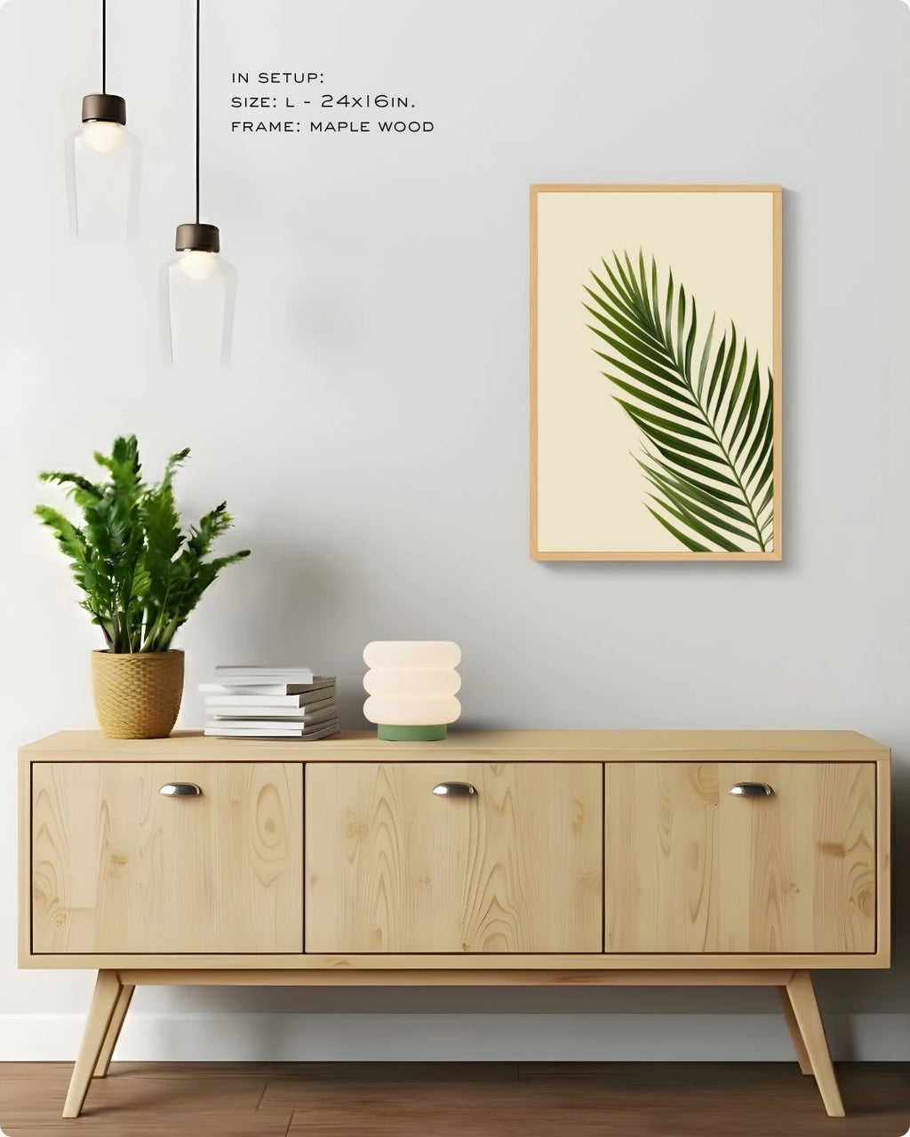 Minimalist palm leaf wall art by K2C Co. in a Maple Wood frame (Size L), styled in a bright Japandi living room mockup above a wooden buffet.