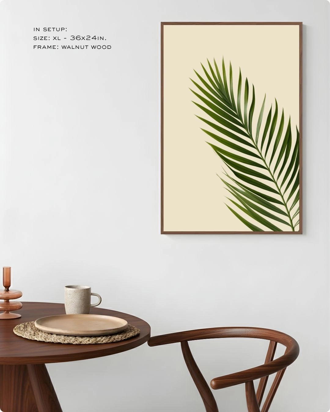 Tropical palm leaf wall art in a Walnut Wood frame by K2C Co., featured in a warm, airy dining room setup to highlight natural Japandi decor vibes.