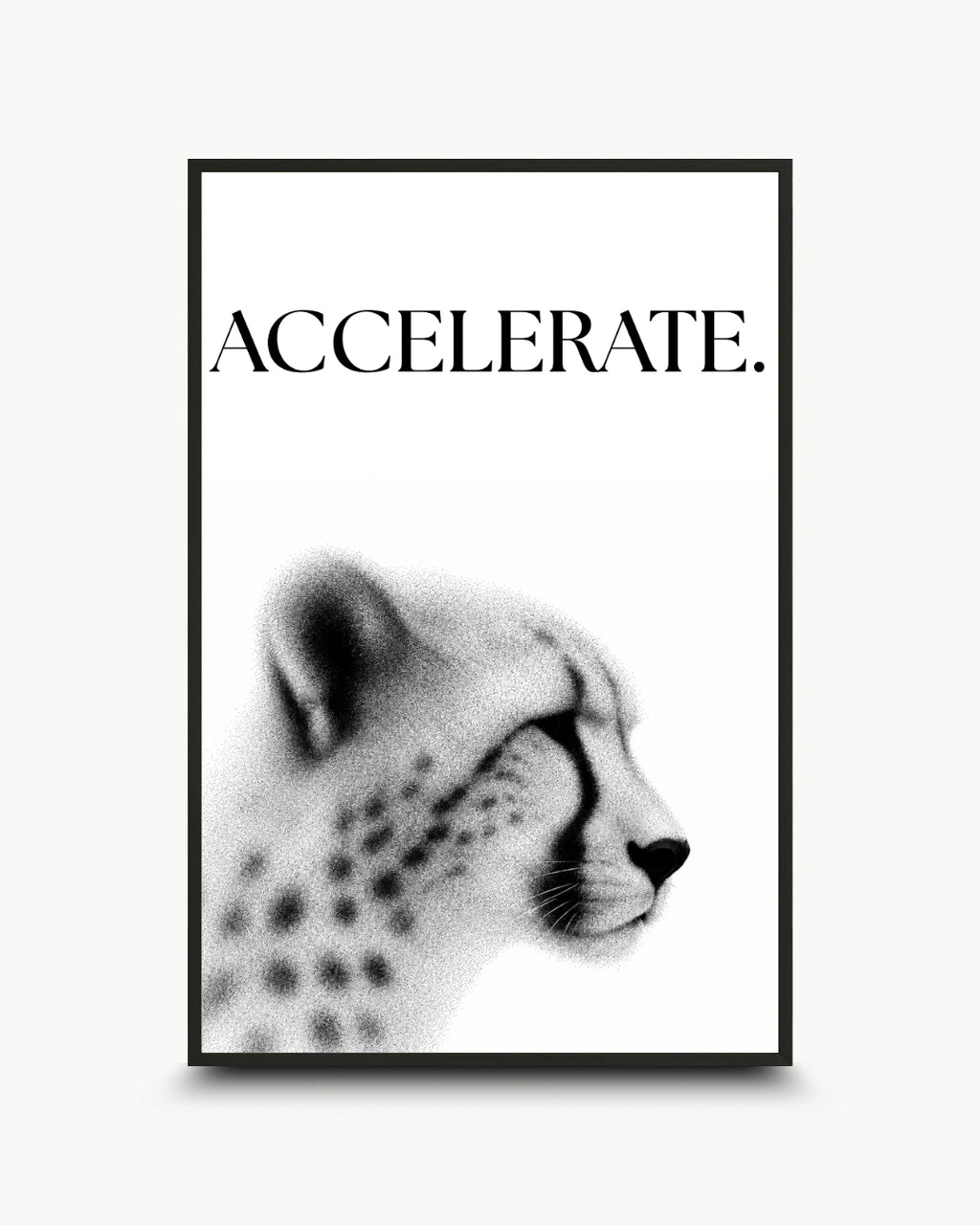 A framed black and white art print featuring the word 'ACCELERATE.' above a stylized cheetah profile, shown against a light gray background.