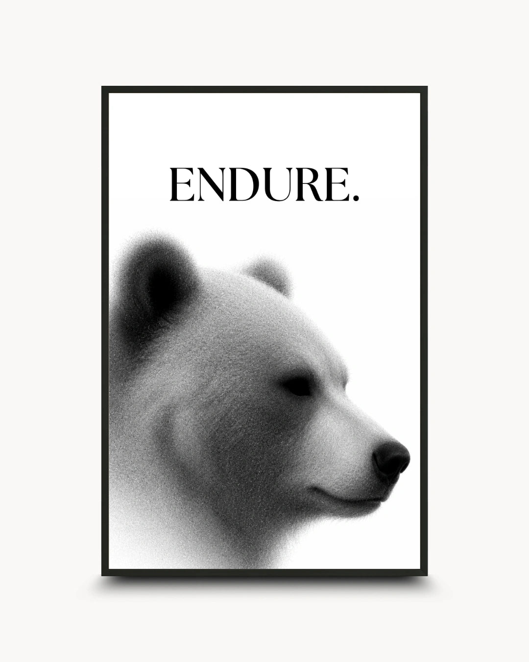 A framed black and white art print featuring a polar bear profile with the word 'ENDURE.' printed above it, shown against a light gray background.