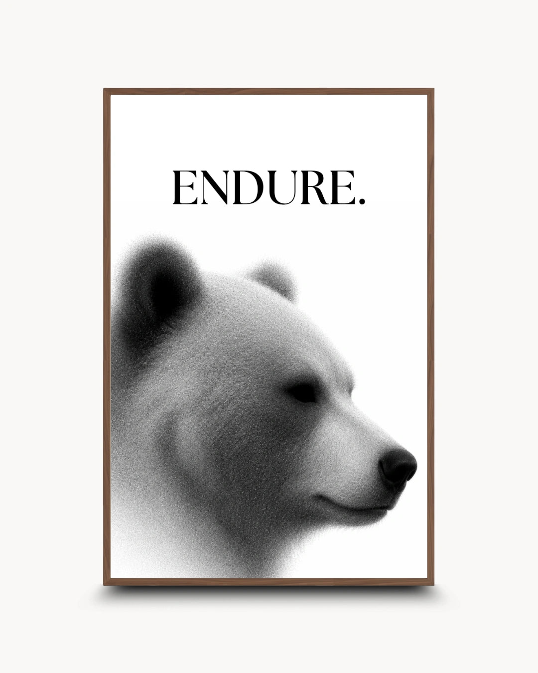 A framed art print featuring a black and white profile portrait of a polar bear with the word 'ENDURE.' printed above it in black serif text, set against a light gray background.